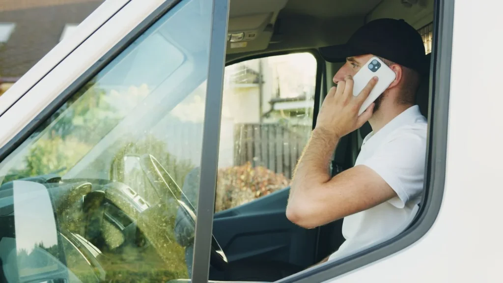 AI call agent use case: man in his vehicle taking a phone call between jobs