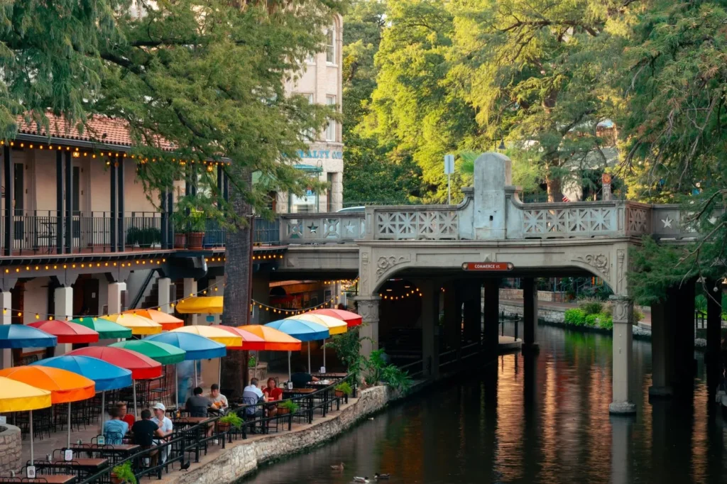 Colorful restaurant umbrellas along the San Antonio River Walk
